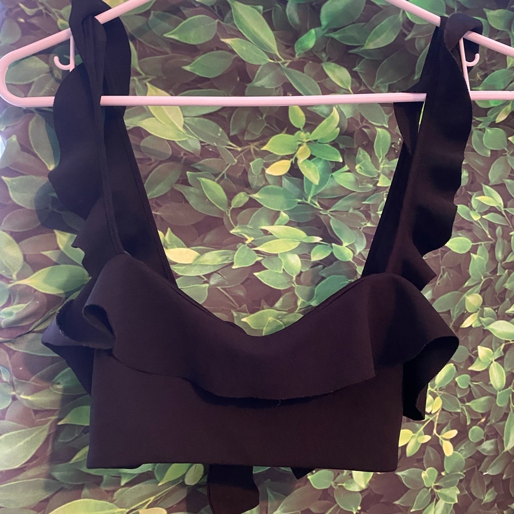 Great condition, with ruffle straps. Goes great with cute jacket or without.